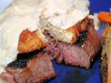 Grilled Beef Filet With Crab Cakes and Caramelized Onion Sauce