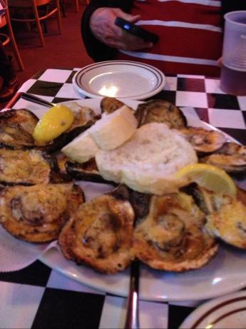 Chargrilled Oysters Acme Oyster House Style. Photo by JaneFHopson