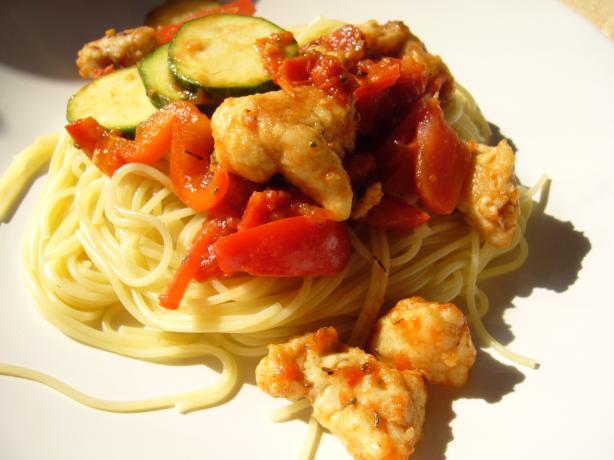 Chicken With Peppers, Zucchini and Tomatoes on Angel Hair. Photo by cookiedog