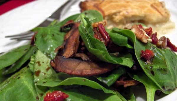 Spinach Salad With Pecans and Sun-Dried Tomato. Photo by Derf