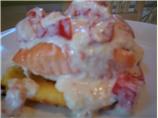 Salmon over Gritcakes With Tomato Alfredo