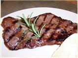 Rosemary-Roasted Garlic Strip Steaks