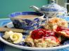 Traditional English Tea Time Scones With Jam and Cream