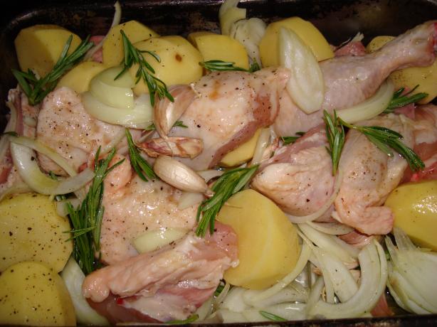 Portuguese Chicken Baked With Potatoes and Garlic. Photo by Brian Holley