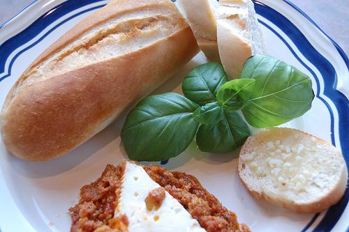 Queso De Cabra Con Tomate (Goat Cheese Baked in Tomato Sauce). Photo by Krista Roes