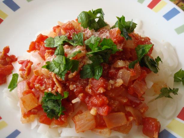Spaghetti With Tomatoes, Bacon, and Onions. Photo by Starrynews