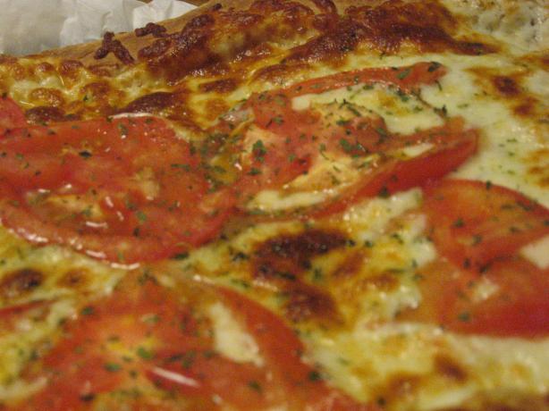 Tomato White Pizza. Photo by scancan