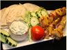 Pork Skewers With Avocado Tzatziki Sauce. Recipe by gregory schulte