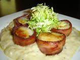Bacon Wrapped Sea Scallops Served on Creamy Brie Sauce