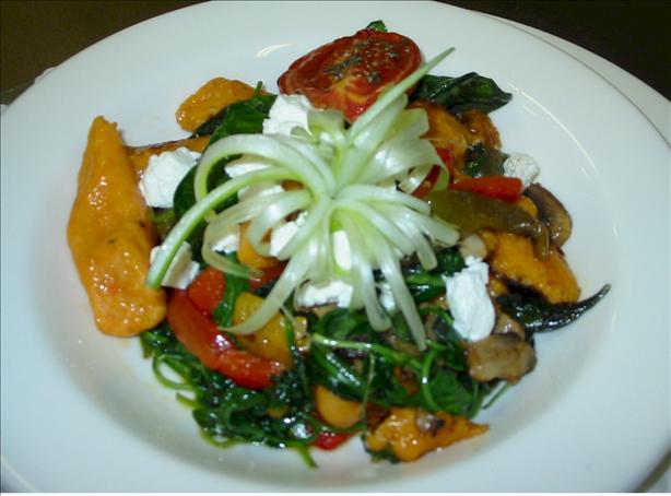 Sweet Potato Gnocchi With Goats Cheese and Wilted Salad. Photo by An_Net