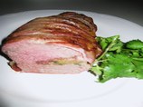 Bacon Wrapped Beef Tenderloin With Herb Stuffing