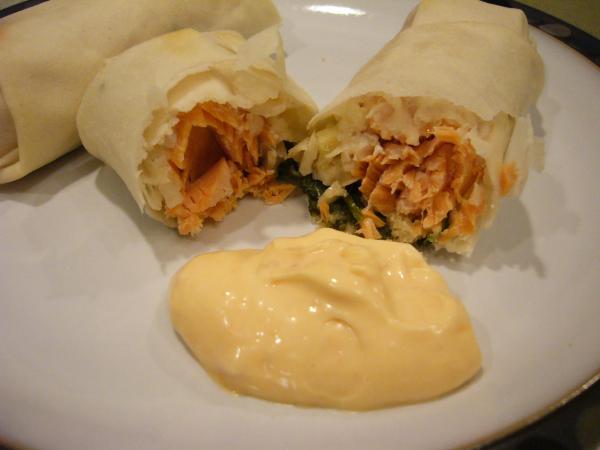 Golden Fried Salmon Spring Rolls With Lime Chili Mayo Sauce. Photo by cyaos