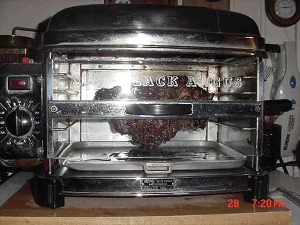 Pork Shoulder on a Rotisserie. Photo by Timothy J Higgins Eva