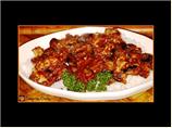 Saut&eacute;ed Eggplant and Pork in Tomato Sauce on Rice