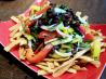 Peppers and Black Beans on a Bed of Crunchy Tortilla Strips. Recipe by 2Bleu