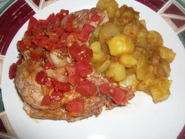Cajun Smothered Pork Chops. Photo by mightyro_cooking4u