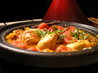 Spicy Chicken Tagine With Apricots, Rosemary, and Ginger. Recipe by Amber Dawn