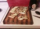 Cheesy Zucchini & Red Onion Flatbread. Photo by College Girl