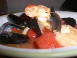Seafood Trio With Fire Roasted Tomato Garlic Sauce. Photo by cookiemakin'mama