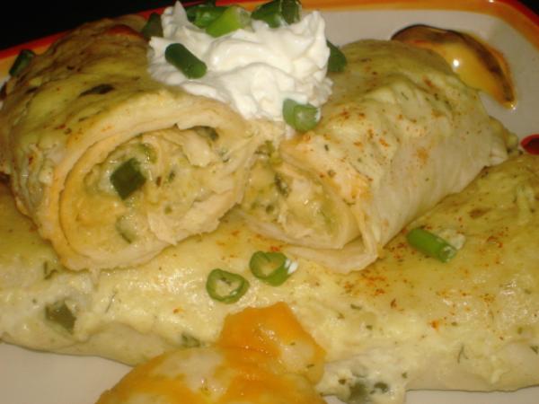 Roasted Poblano and Chicken Enchiladas With Sour Cream Sauce. Photo by Linajjac