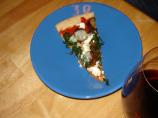 Feta, Spinach and Chicken Sausage Pizza. Photo by Ewalla