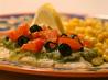 Oven Roasted Tilapia With Tomatoes, Pesto and Lemon
