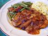 Pork Chops With Tangy Onion Sauce. Recipe by Seasoned Cook