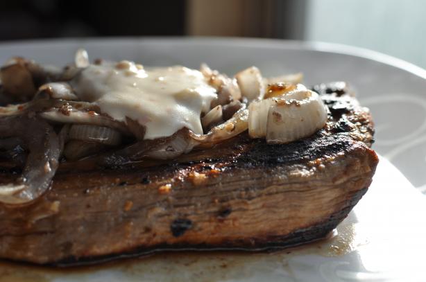 Smothered Flat Iron Steak in a Parmesan Pepper Sauce. Photo by Abby's Mom