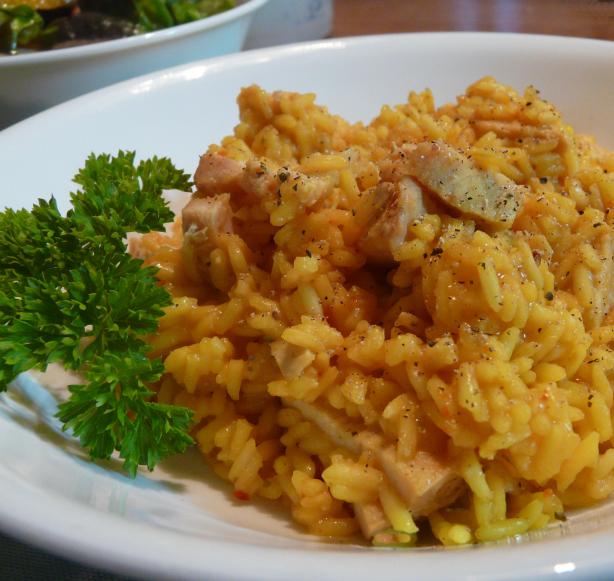 Too Tired, & Broke, Yellow Rice and Chicken. Photo by PaulaG