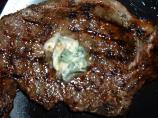 Grilled Crusted Steak With Lemon Butter. Photo by Miraklegirl