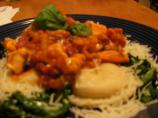 Spicy Chicken Rustica on Ravioli and Arugula