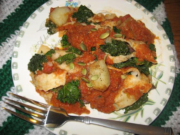 Potato Kale Enchiladas With Roasted Chili Sauce. Photo by averybird