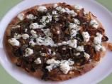 Grilled Pitas With Caramelized Onions and Goat Cheese
