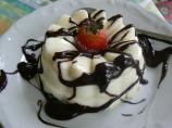 White Chocolate Panna Cotta With Dark Chocolate Sauce