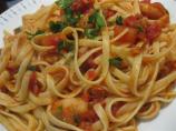 Linguini With Garlicky Shrimp and Fresh Tomatoes. Photo by Chickee
