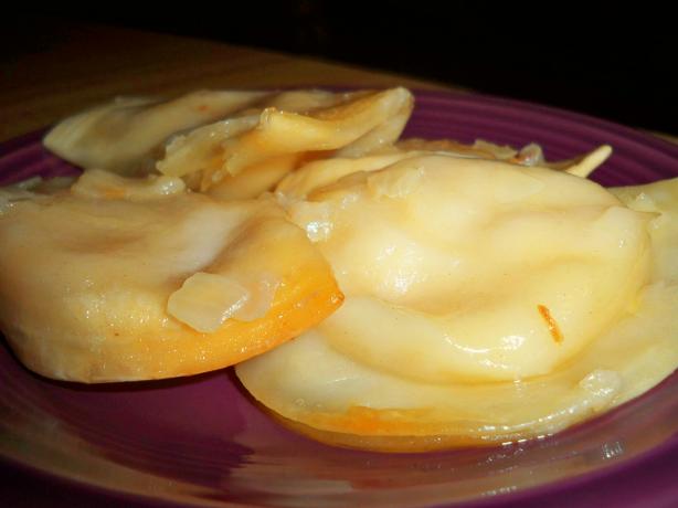 Crock Pot Potluck Pierogies With Sauteed Onions and Butter. Photo by Lainey6605