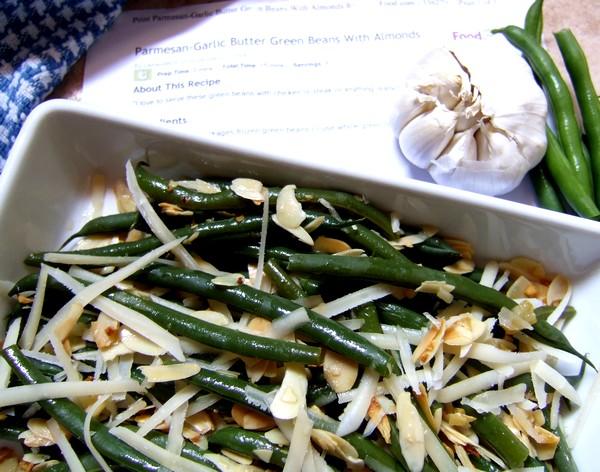 Parmesan-Garlic Butter Green Beans With Almonds. Photo by Zurie