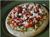 Leek, Tomato, Goat Cheese Pizza. Recipe by Kevin Kirkland