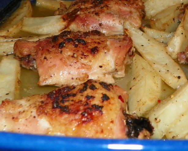 Amazing Baked Lemon Garlic Chicken Thighs and Potatoes. Photo by Baby Kato