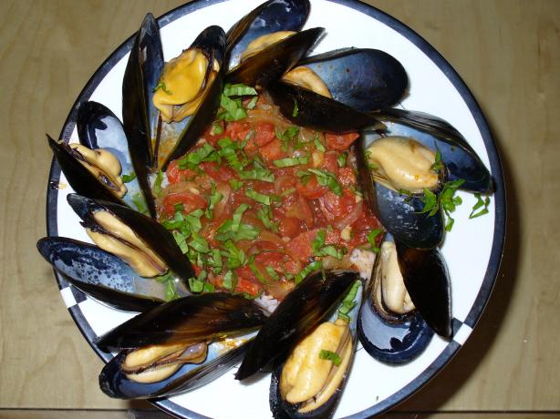 Steamed Clams With Chorizo and Tomatoes. Photo by IngridH