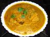 Steamed Lentil Dumplings in Tangy Gravy