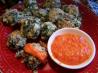 Baked Spanish Spinach Balls in Roasted Bell Pepper Sauce (Albond