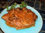 Smothered Pork Chops With Tomato Cream Gravy