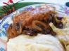 Smothered Pork Chops With Tomato Cream Gravy