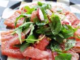 Baby Arugula and Walnut Salad in a Tomato Bowl