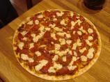 Boursin Cheese and Sun-Dried Tomato Pizza. Photo by Baz