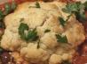 Whole Baked Cauliflower With Tomato and Olive Sauce. Recipe by Irmgard