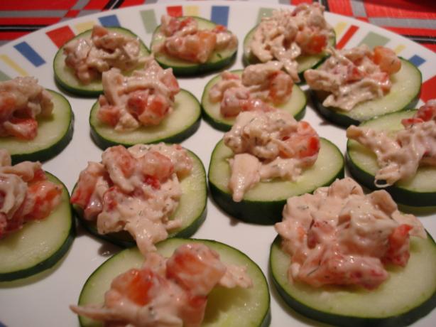 Delicate Cucumber and Strawberry Tea Slices. Photo by Starrynews