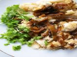 Grits With Caramelized Onions and Goat Cheese