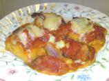 Baked Polenta With a Tomato Sauce. Photo by Shuzbud